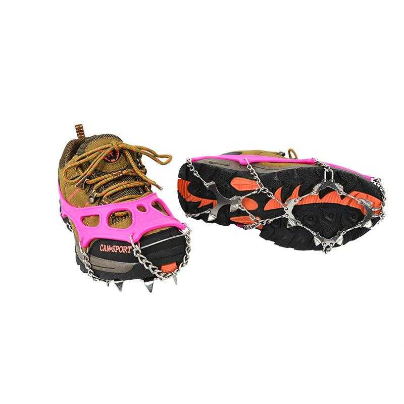 Yatta Life ice spikes on two hiking shoes, one flipped to show chains on sole